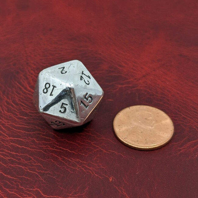 A 20-sided die cast in solid sterling silver for roleplaying games like Dungeons & Dragons.