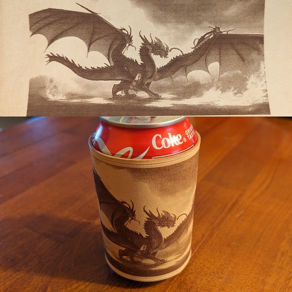 Hand stitched leather coozie for 12oz cans laser engraved with an AI-generated image of a dragon walking through a field of fire. The whole image is shown at top.